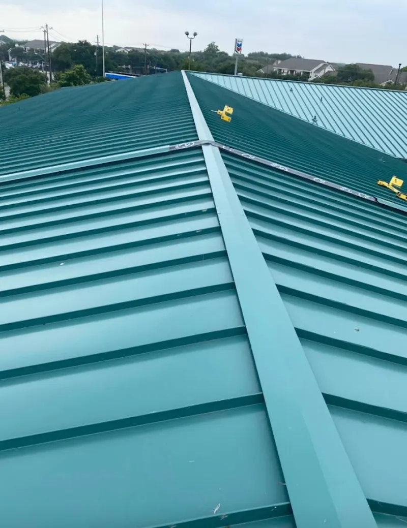 Green commercial metal roof ridge and valley for Metal Roof Repair in Cheney