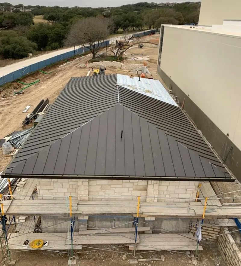 Metal roof new construction with scaffolding in Cheney