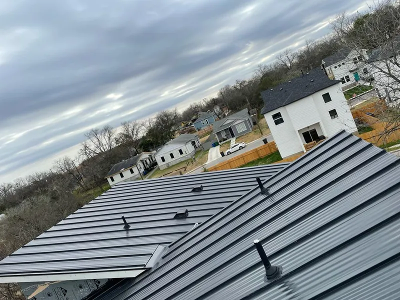 Standing seam metal roof panels with vents for Skylight Repair in Cheney